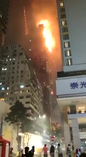 Skyscraper under construction on fire in Hong Kong
