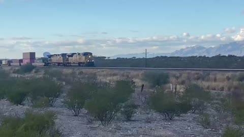 Slow eastbound train leaving Tucson 2/16/2022