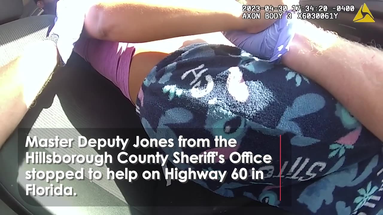 HEROIC police deliver baby on highway