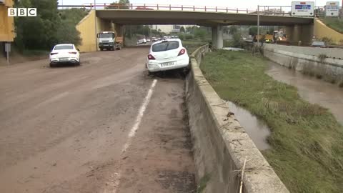 Severe flooding hits Spain's east coast after record rainfall - BBC News