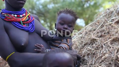 african woman breastfeeding