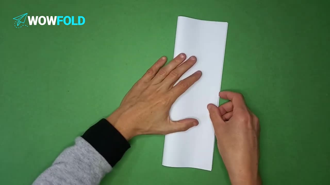 The Rainmaker - folding a paper airplane