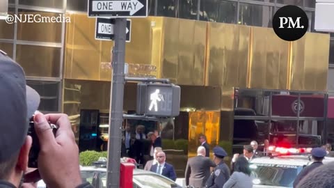WATCH: President Trump smiles and waves at supporters as he arrives at Trump Tower
