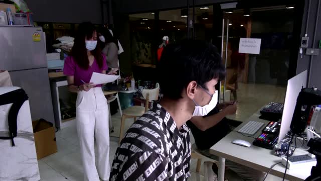 Young Thais seek online fortune-telling to ease anxieties