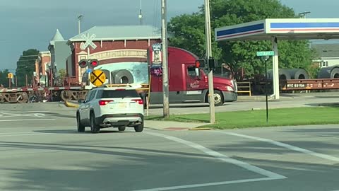 Train Plows Through Semi Stopped on Level Crossing