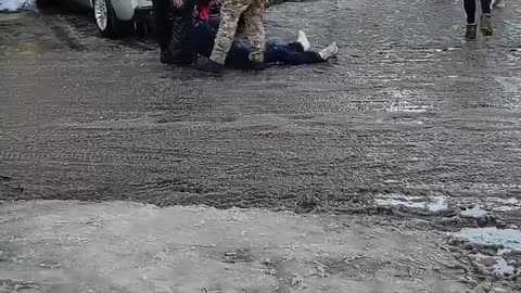 Ukrainian militants dragging men off the streets and sending them to the front