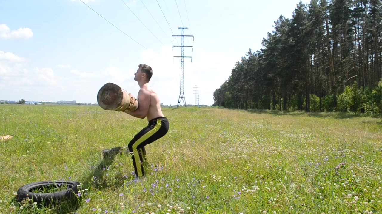 Man Builds Muscle Strength While Doing CrossFit Workout