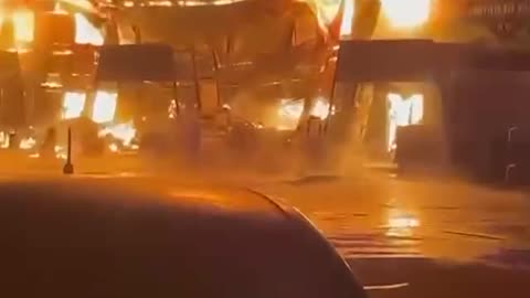Large Building Under Construction Continues to Burn