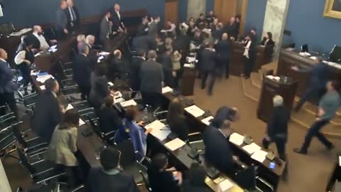 NOW - Chaos breaks out in the Georgian parliament.