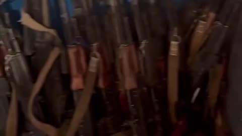 Ukrainians Collect Dozens of Rifles from Dead Russians