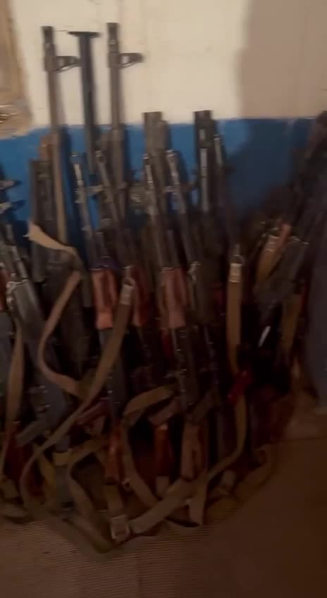 Ukrainians Collect Dozens of Rifles from Dead Russians