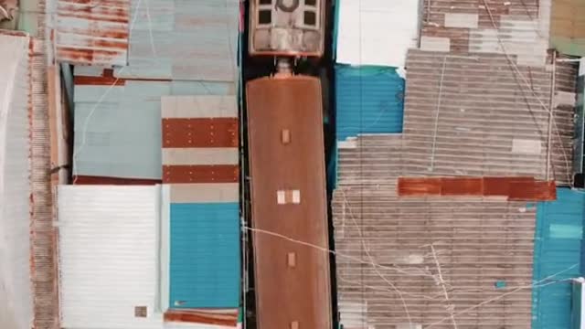 stop scrolling and watch the train passing through mae klong market