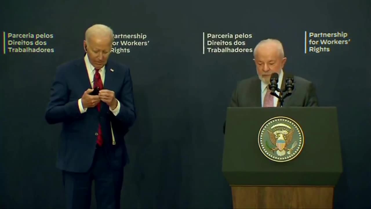 Bumbling Biden Can't Figure Out His Earpiece