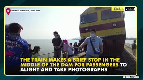 Impressive! Thailand's 'floating train' a big hit as dam waters rises