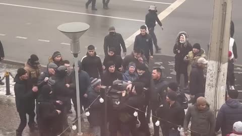 In Alma-Ata, where protests resumed this morning, protesters attacked a security officer and took