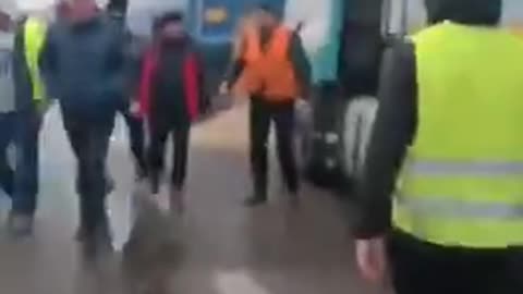 Polish farmers emptying the grain from trucks from Ukraine