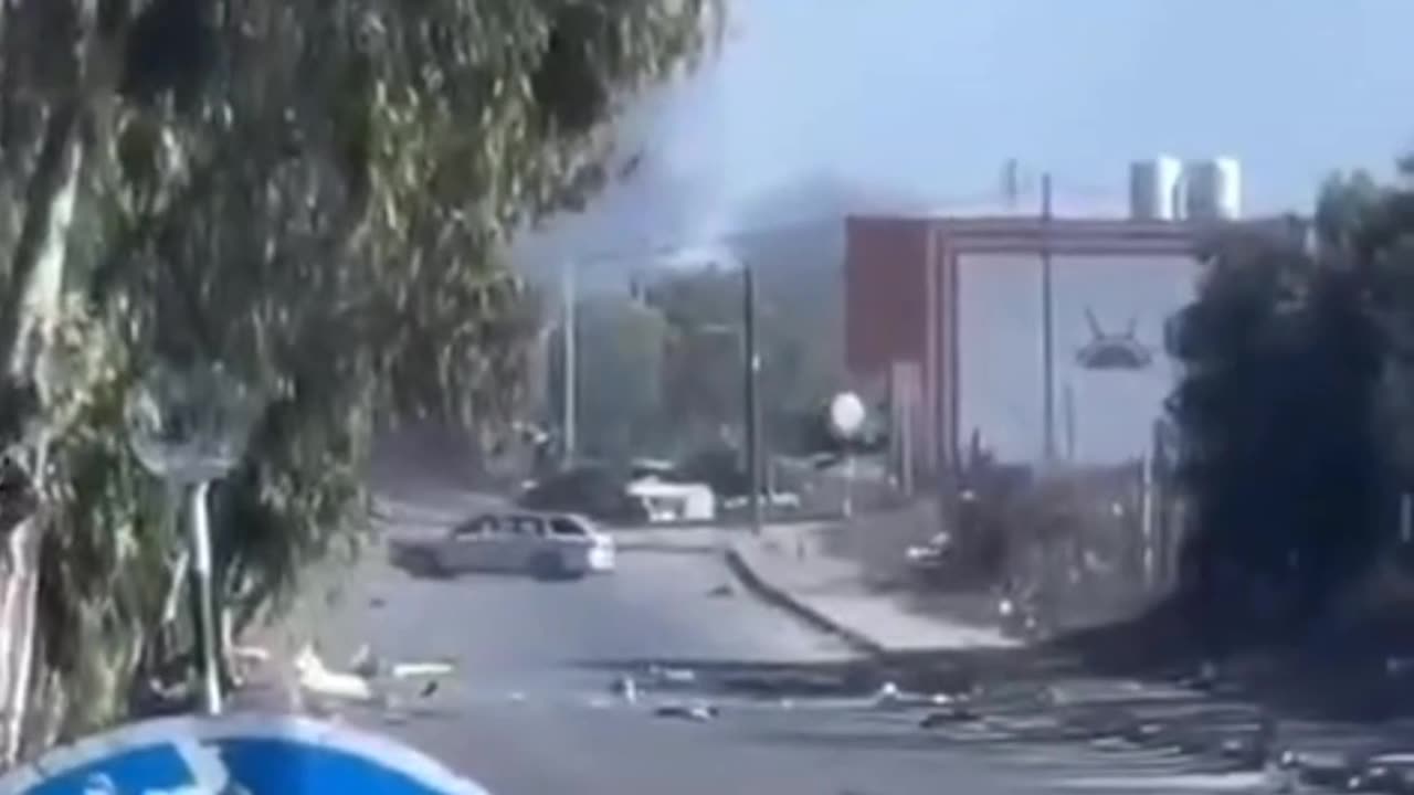 Israeli Merkava Tank firing on civilian vehicle in the neighborhood of North Gaza