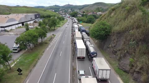 Truckers block highway after Bolsonaro defeat in Brazil election | AFP