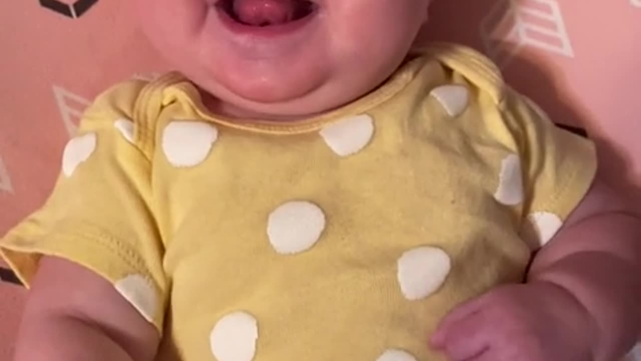 Joyful Baby Bursts Into Laughter During Mom's Talk