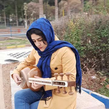 Iranian girl playing a beautiful song