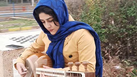 Iranian girl playing a beautiful song