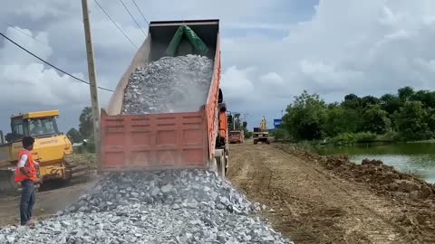 New bulldozer spreading gravel processing features building road foundation-9