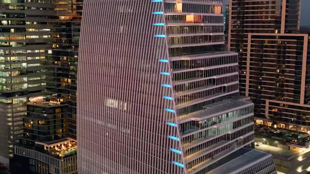 Modern building in an aerial shot at dusk