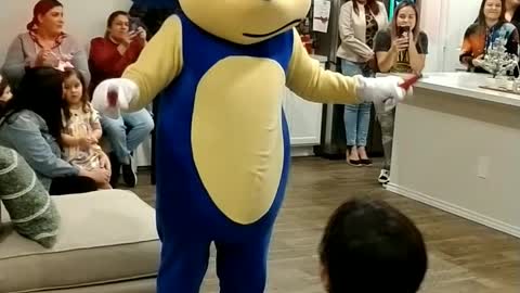 Knunchuk toss game at Gameboy prop at birthday party in Katy Texas with sonic cosplay character