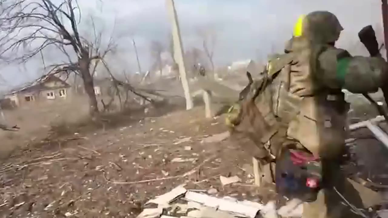 Avdiivka._Female_Ukrainian_combat_medic_fires_back_as_Russian_tanks_attack_trench