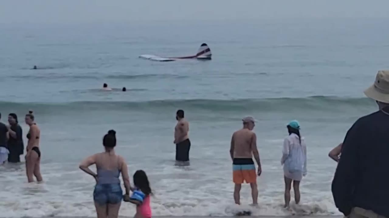 Small plane crashes Into surf at New Hampshire's Hampton Beach