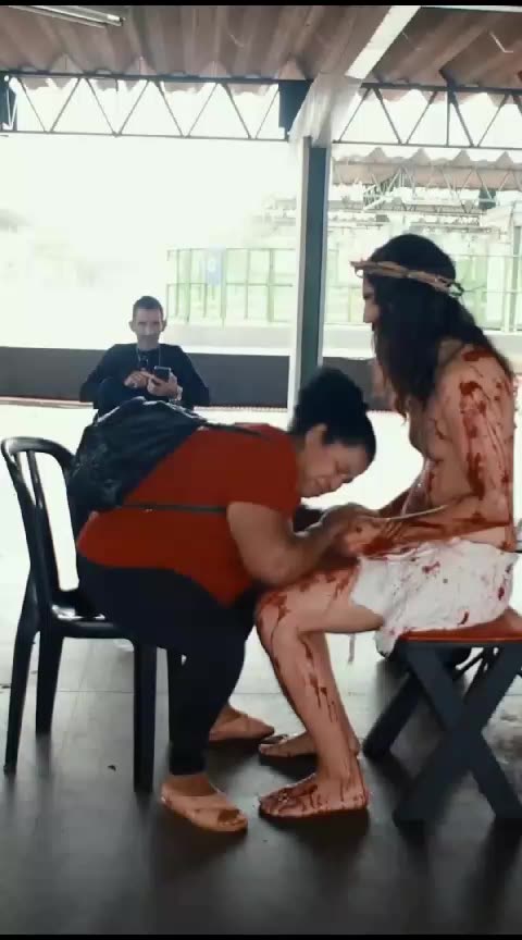 Moving scene during Holy Week: Man represents Jesus Christ and moves passersby