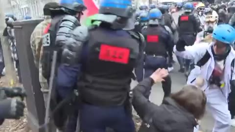 Violent clashes erupt at massive protest against pension reform in Paris