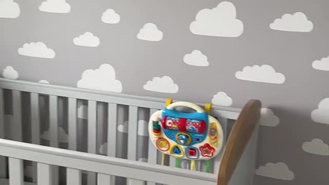 When someone buys your baby a colourful toy and it ruins your grey aesthetic
