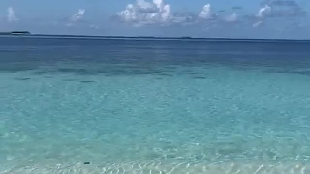 Lying on the beach in the sun