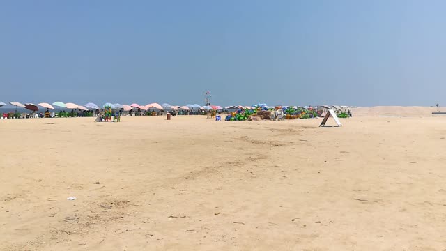 Tourists Gathered Up In Ras In Bar Beach , Morning Sunny Day