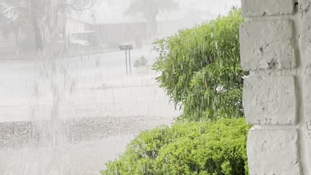 River Pours From Roof During Monsoon Rain