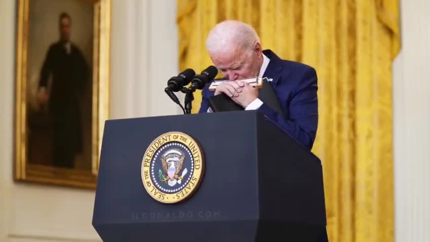 Biden playing the Harmonica