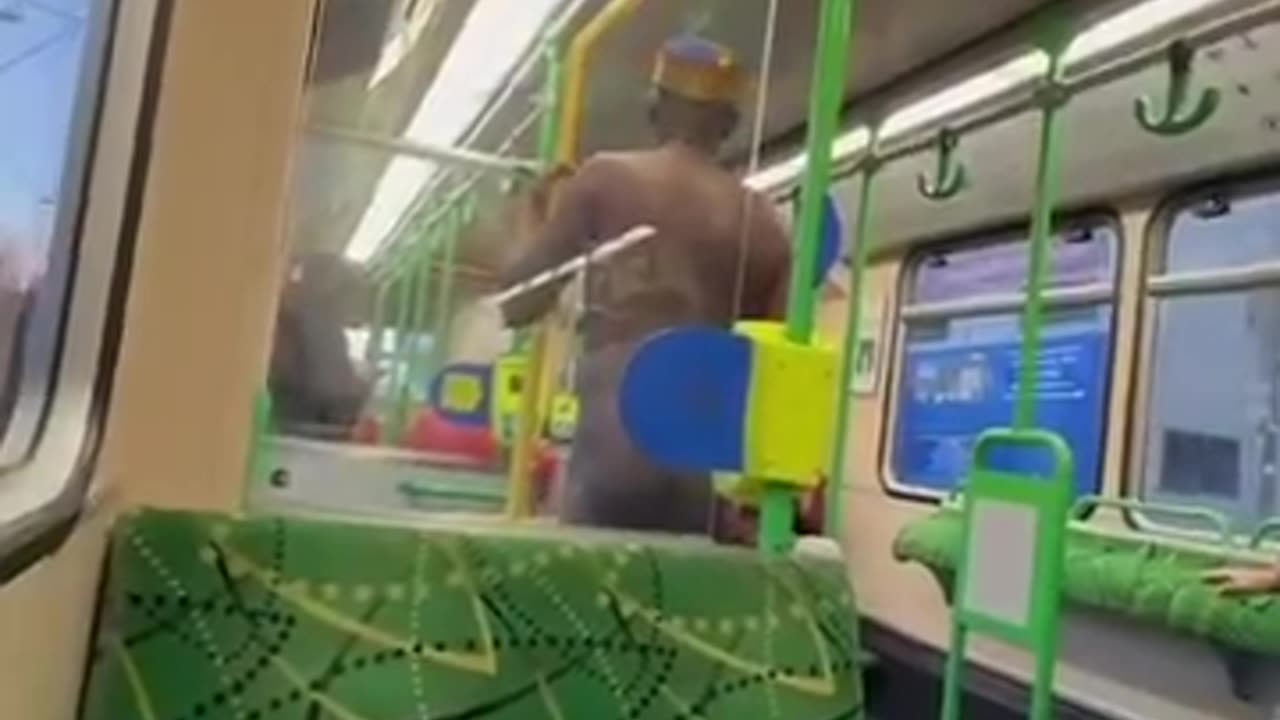 Fed-up Aussie passenger kicks naked African man off a Melbourne tram