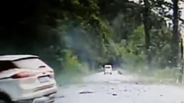 Bolder smashes car on chinese road!
