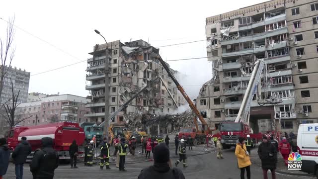 Crews rescue woman from rubble of Ukraine apartment building