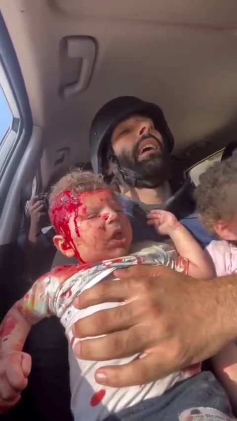 ►🇮🇱🇵🇸◾️Palestinian journalist rushes to hospital with two rescued babies from under rubble