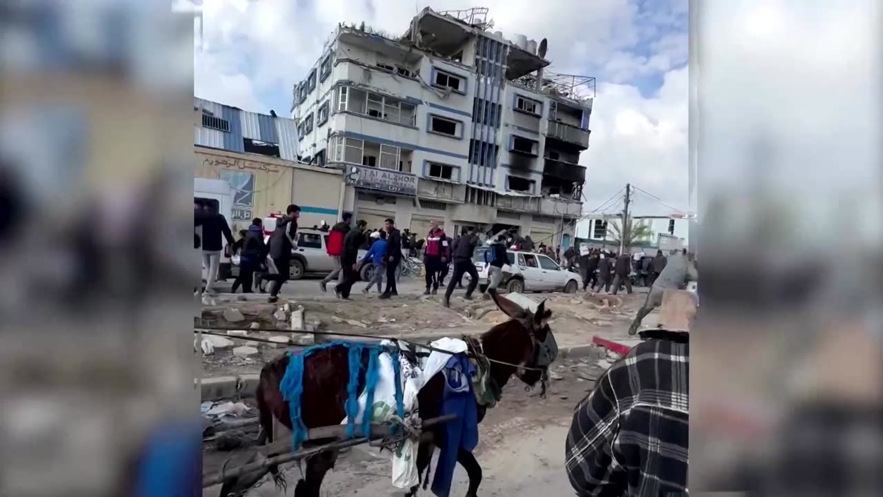 Chaotic aid distribution under gun fire in Gaza City