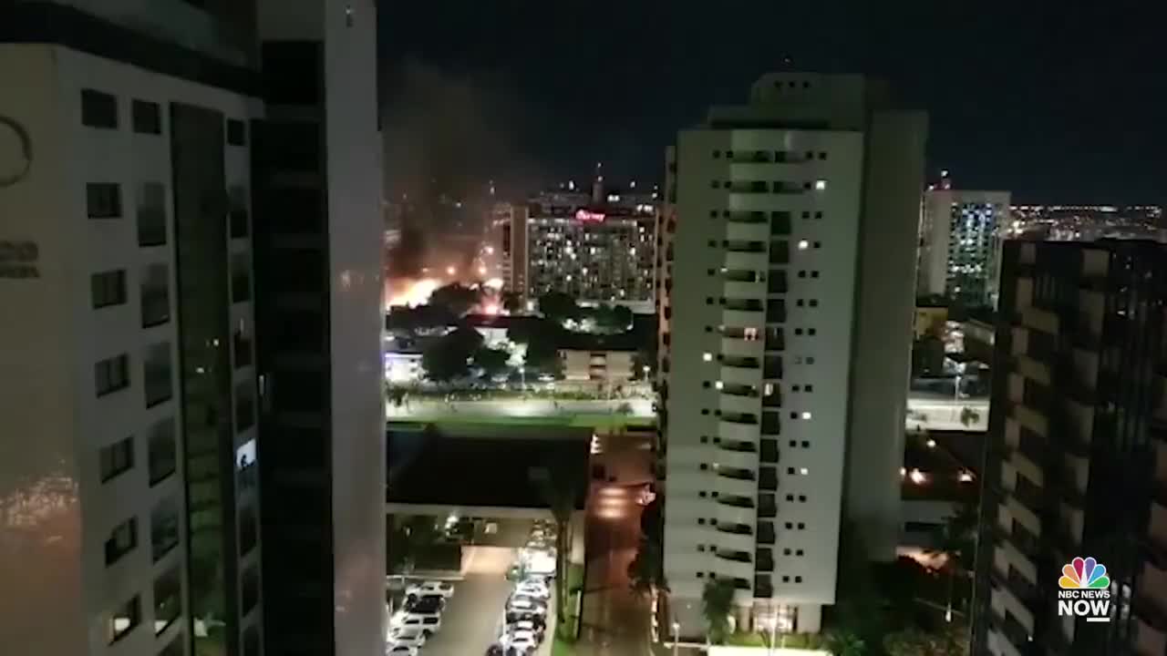 Supporters Of Brazil's Bolsonaro Torch Vehicles, Clash With Police In Brasília