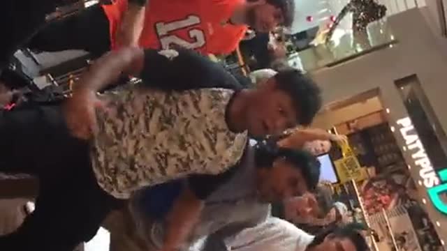 New Zealand protesters do the Haka inside a "vaccinated only" shopping complex