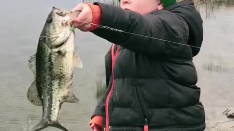 Kid gets very EXCITED to show his FIRST fish to his grandpa