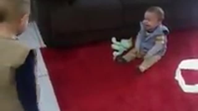 Baby Boy Can't Stop Laughing At Big Brother's Antics