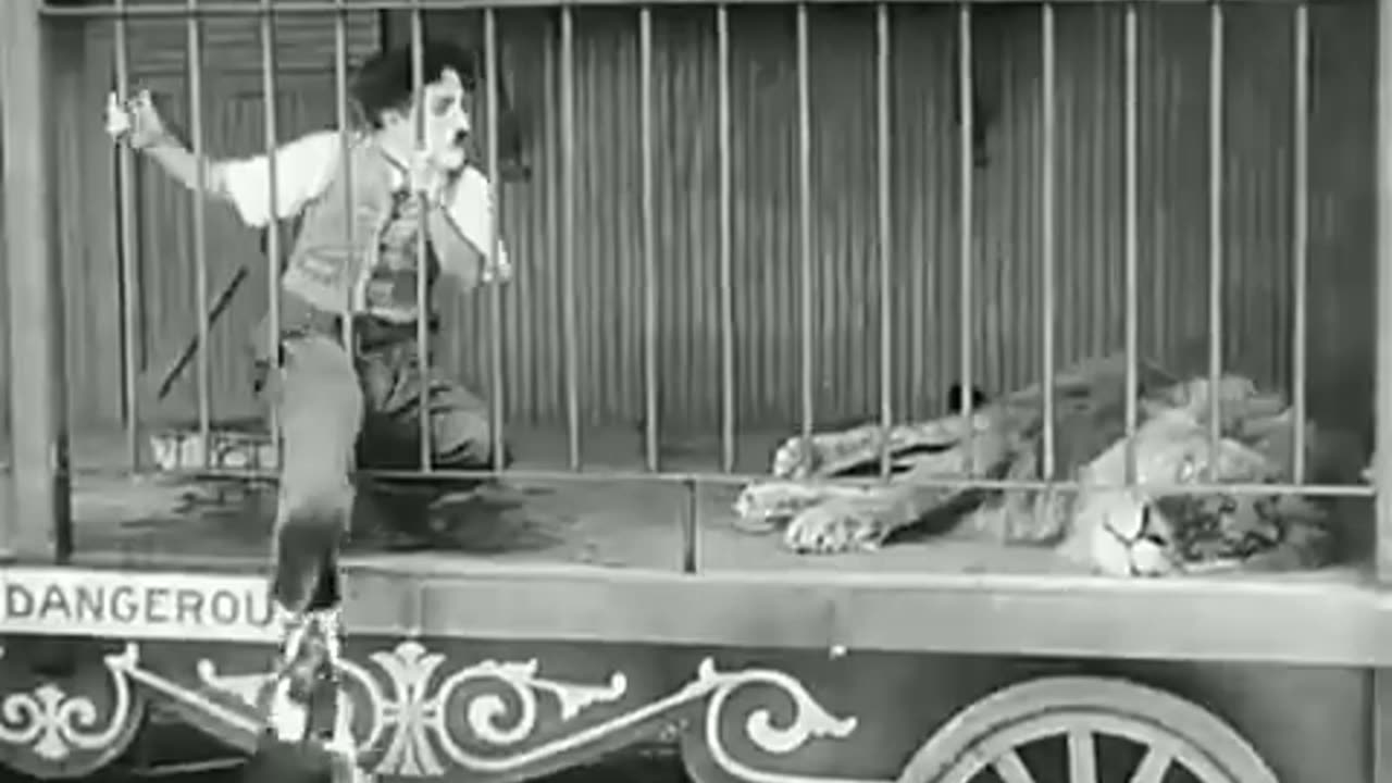 Charlie Chaplin the lion_s Cage