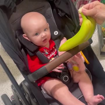 Adorable Baby's First Encounter with Bananas in a Superstore