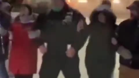 Ottawa Convoy for freedom linked arms in defiance throughout the night.