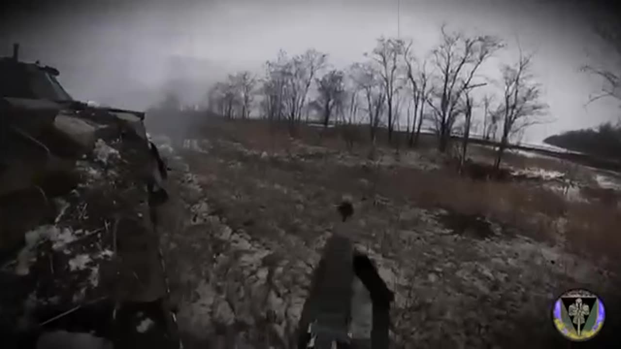 Ukrainians Fire Behind the Cover Of APC